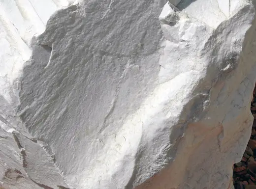 Slab surface: White calcitic marble (Yule Marble, Middle Miocene, 12 Ma; Marble, Gunnison County, Colora