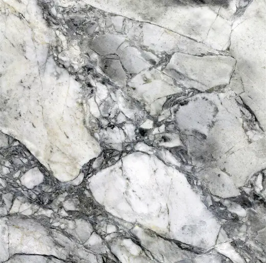 Superficie de losa: Vermont White Marble (Shelburne Formation, Pennsylvanian metamorphism of Ordovician limest