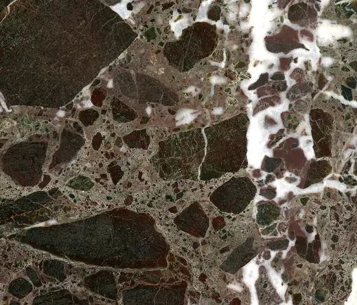 Superficie de losa: Italian Red Antique Marble (tectonic marble breccia; Genoa, Liguria, Italy)