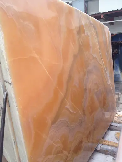 Onice Arancio Orange onice, dettaglio di superficie – Marmi di Carrara – rosa, oro (2)